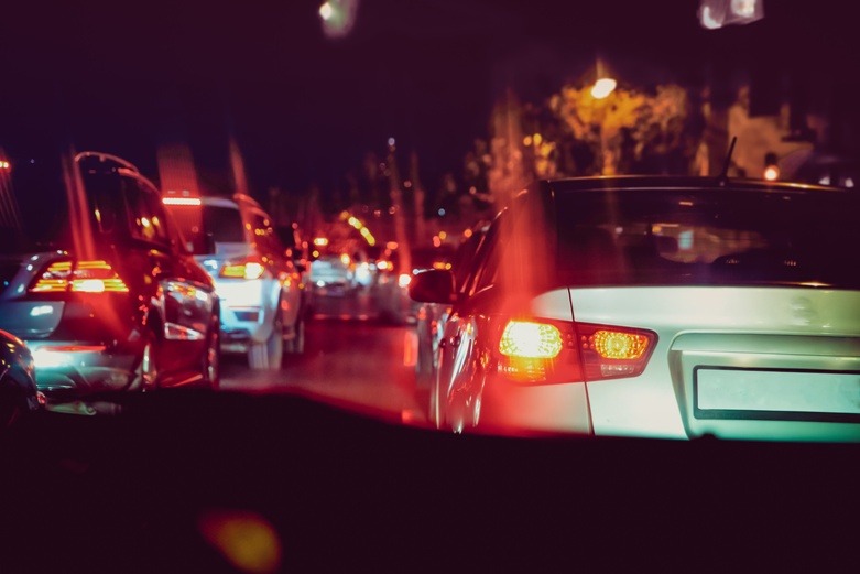 Night scene of cars and traffic on a busy road
