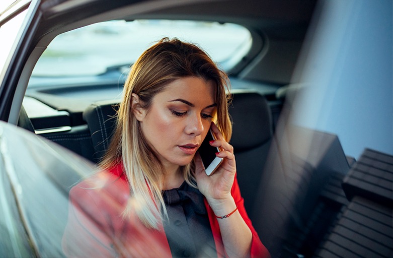 Woman taking a rideshare