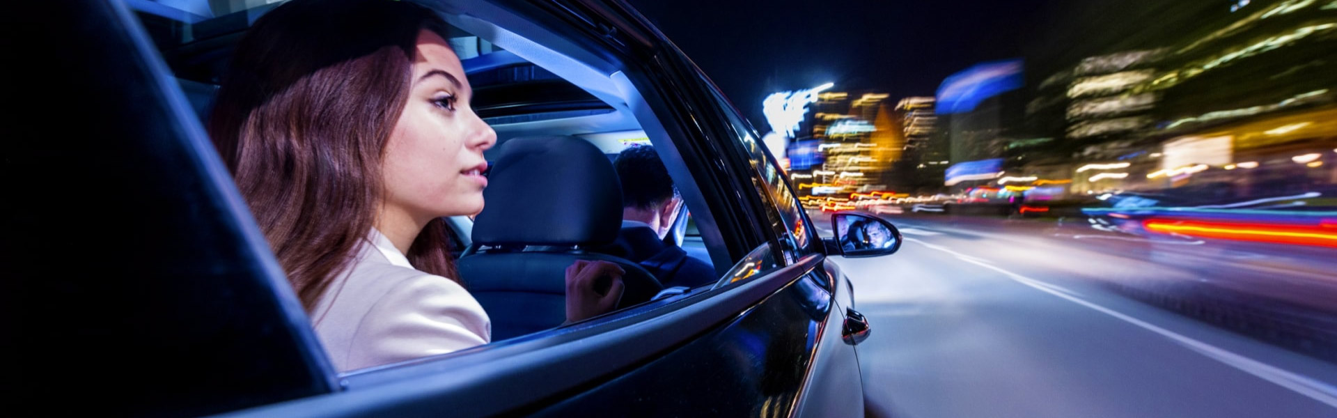 Woman in back seat of Uber